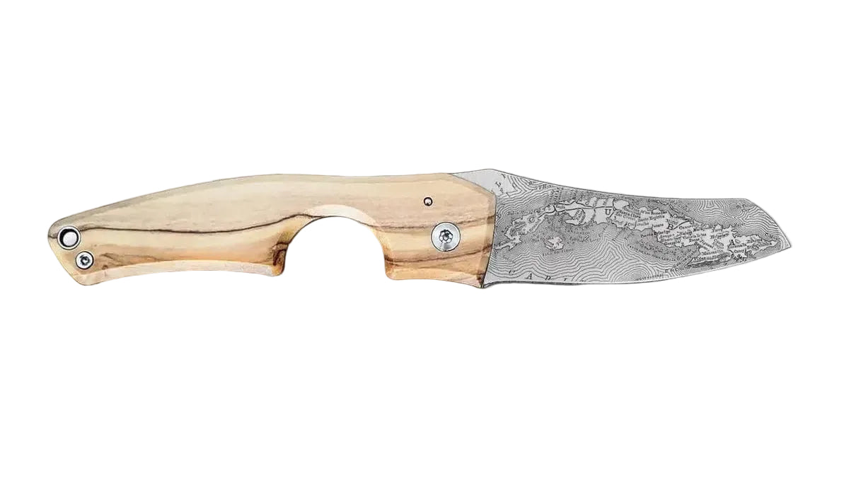 Handcrafted knife with a decorative blade and wooden handle on a white background